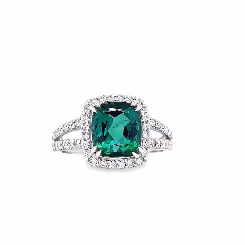 Green tourmaline and diamond halo ring in 14K gold