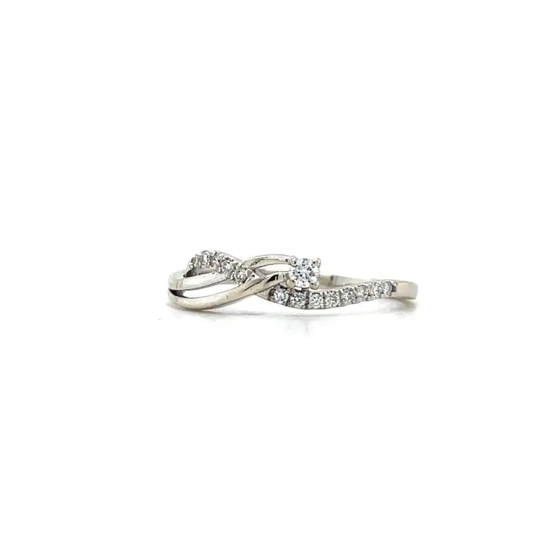 Delicate diamond cluster ring in 14K white gold