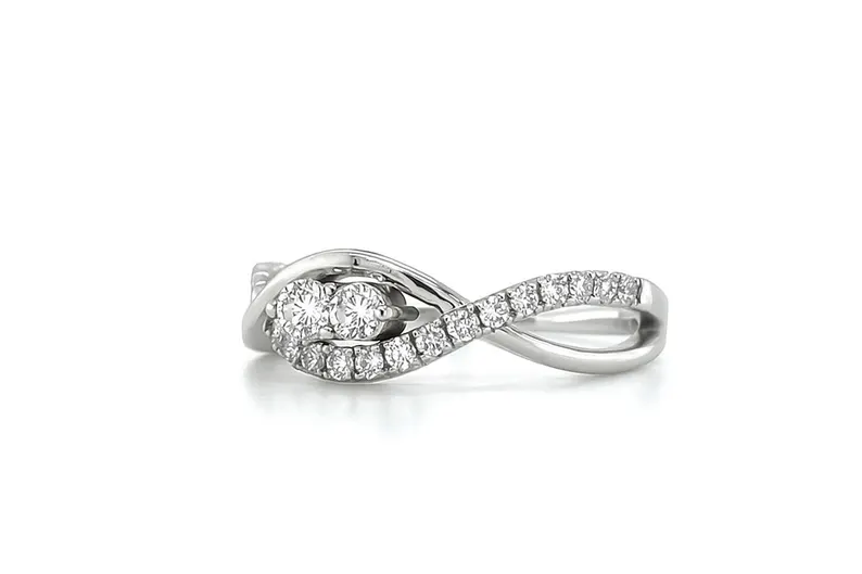 Two-stone diamond twist ring in white gold, first listing